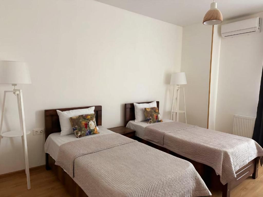 Postel nebo postele na pokoji v ubytování Hotel Home