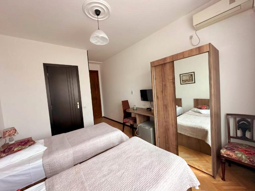 Postel nebo postele na pokoji v ubytování Hotel Home