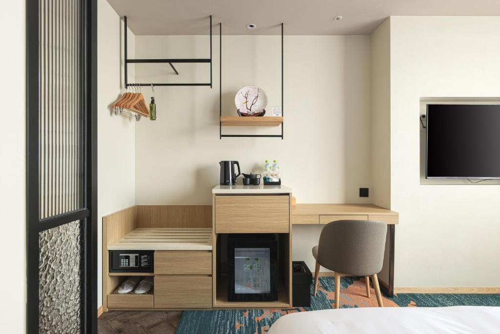 TV a/nebo společenská místnost v ubytování Solaria Nishitetsu Hotel Taipei Ximen