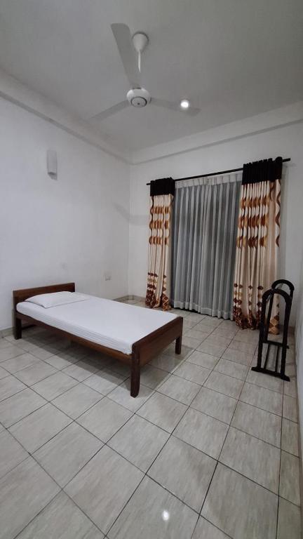Postel nebo postele na pokoji v ubytování Dazzling Villa