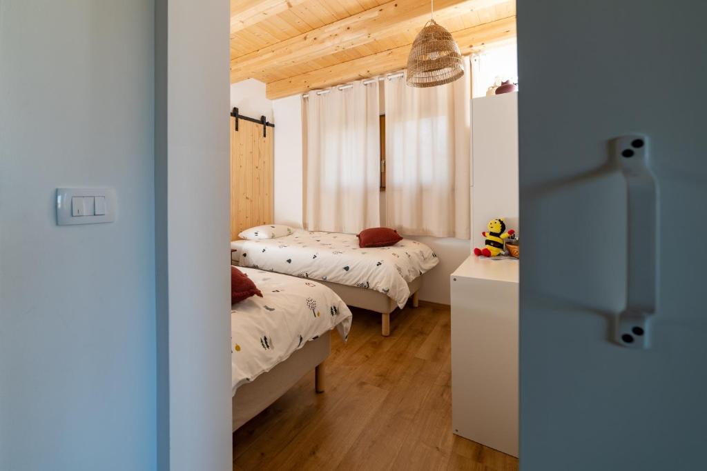 Postel nebo postele na pokoji v ubytování BEe in foREST