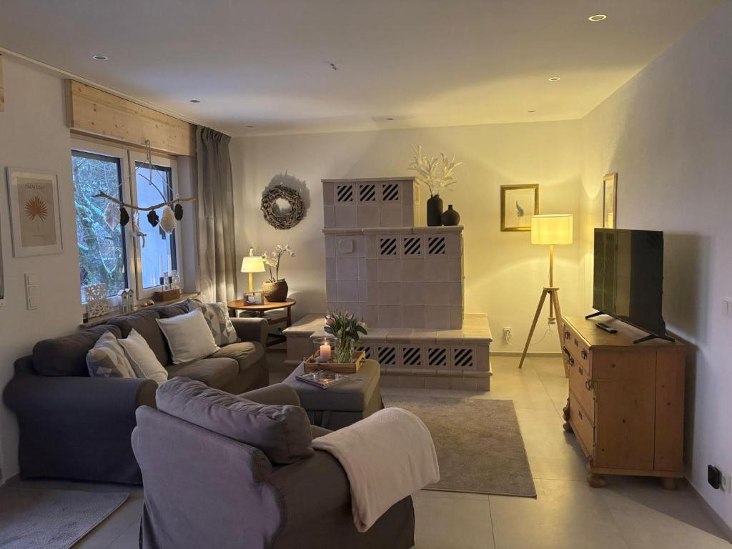 Μια τηλεόραση ή/και κέντρο ψυχαγωγίας στο Ferienhaus "Boomen"