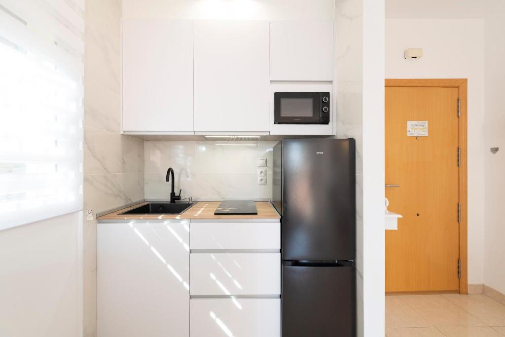 Kuchyňa alebo kuchynka v ubytovaní APARTAMENTO AÑORETa 113