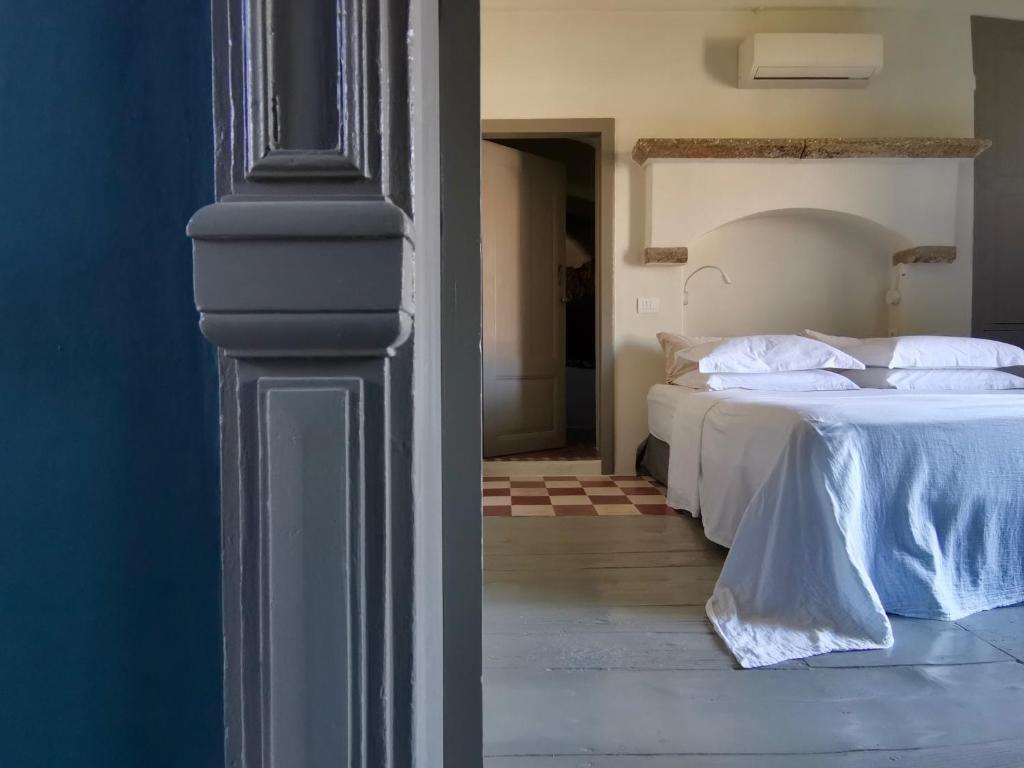 Postel nebo postele na pokoji v ubytování 1900 Hotel