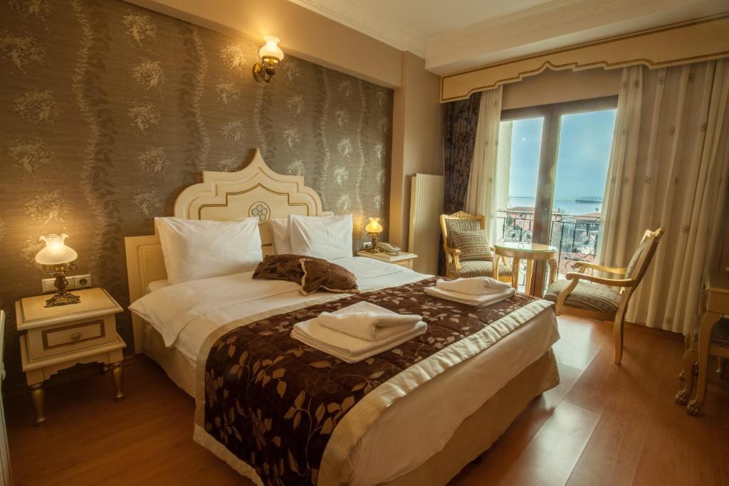 Gulta vai gultas numurā naktsmītnē Saba Sultan Hotel