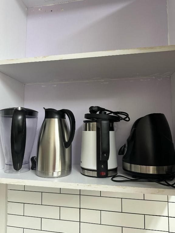 Příslušenství pro přípravu čaje a kávy v ubytování Ecostay condo