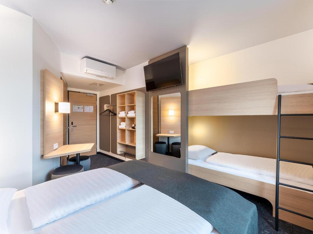 Postel nebo postele na pokoji v ubytování B&B HOTEL St-Pölten