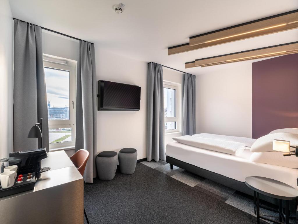 Postel nebo postele na pokoji v ubytování B&B HOTEL St-Pölten