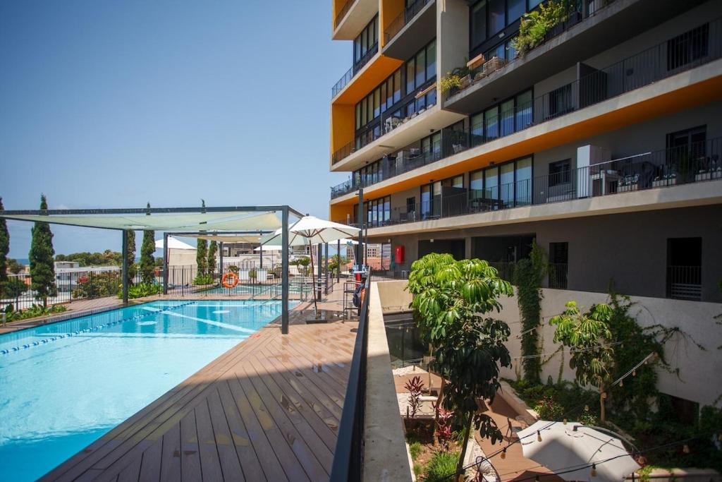 Bazén v ubytování Neve Zedek Luxury Apartments By Vacay nebo v jeho okolí