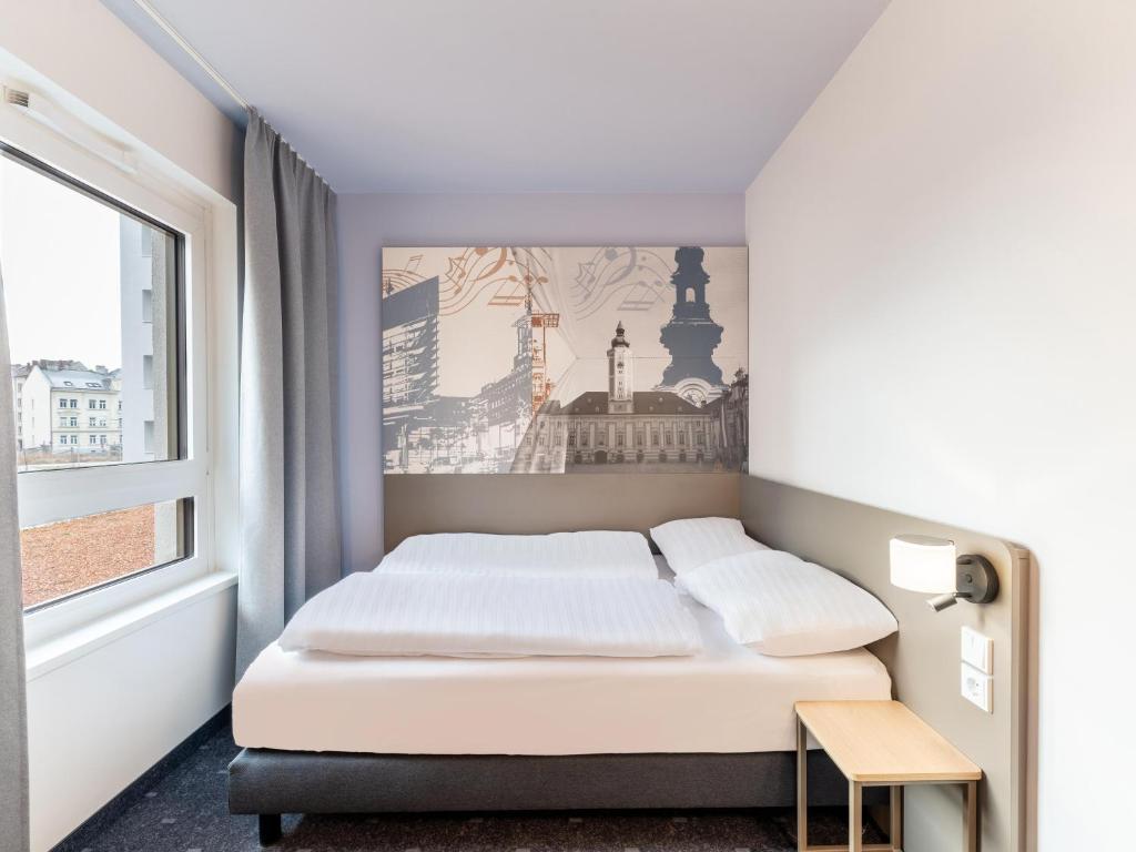 Postel nebo postele na pokoji v ubytování B&B HOTEL St-Pölten