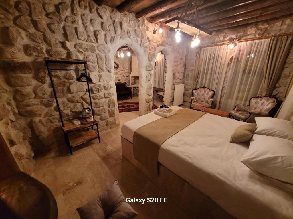 Postel nebo postele na pokoji v ubytování LA DiAS CAVE CAPPADOCİA