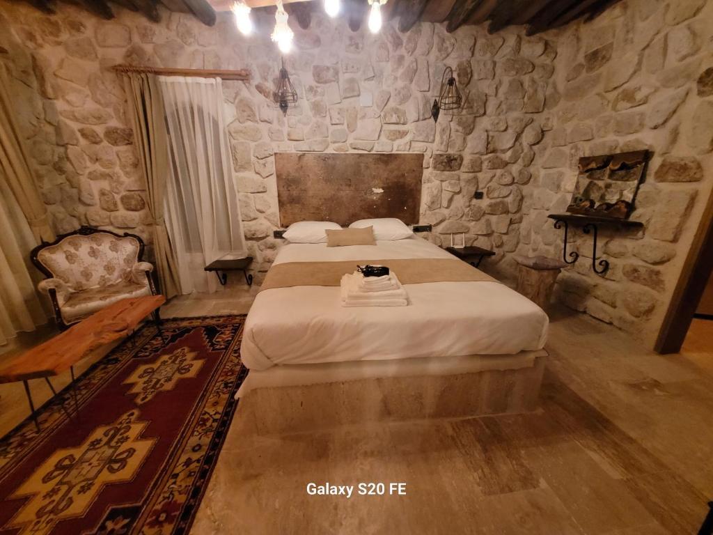 Postel nebo postele na pokoji v ubytování LA DiAS CAVE CAPPADOCİA