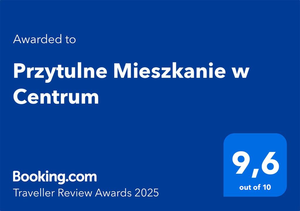 a blue screen with the words pynolithic mitzkamine w on top at Przytulne Mieszkanie w Centrum in Jastrzębie Zdrój