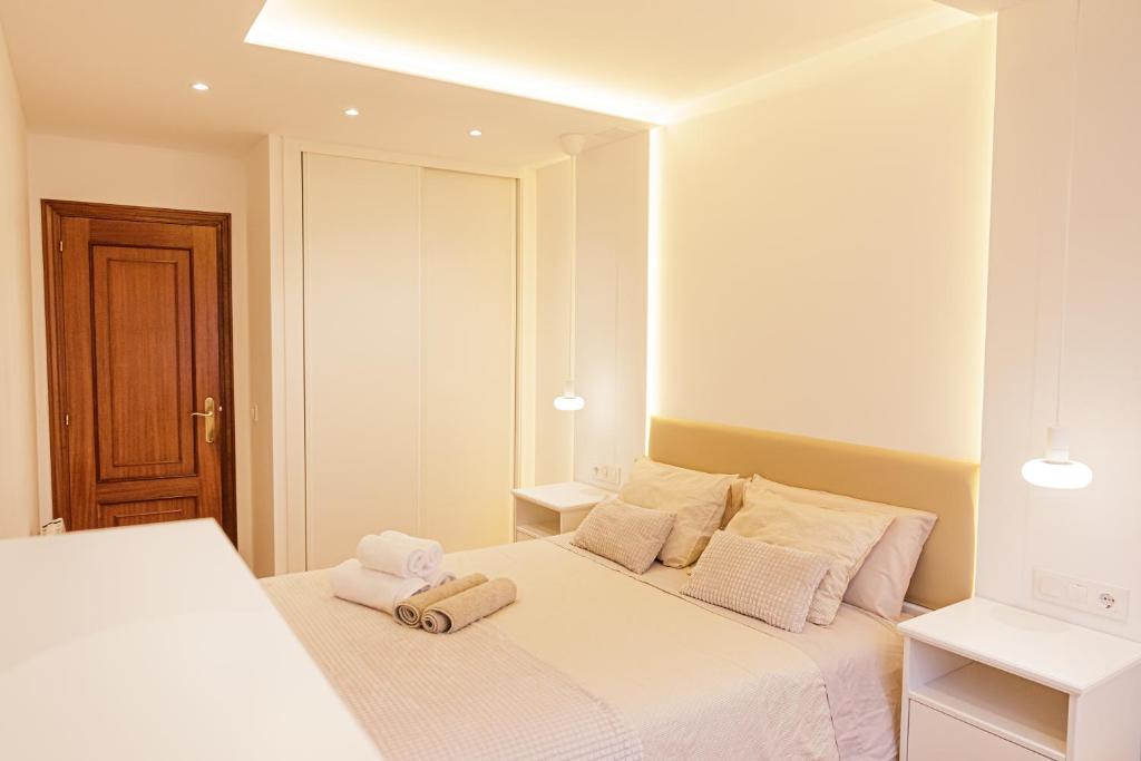 Katil atau katil-katil dalam bilik di Apartamento completo con wifi en Betanzos