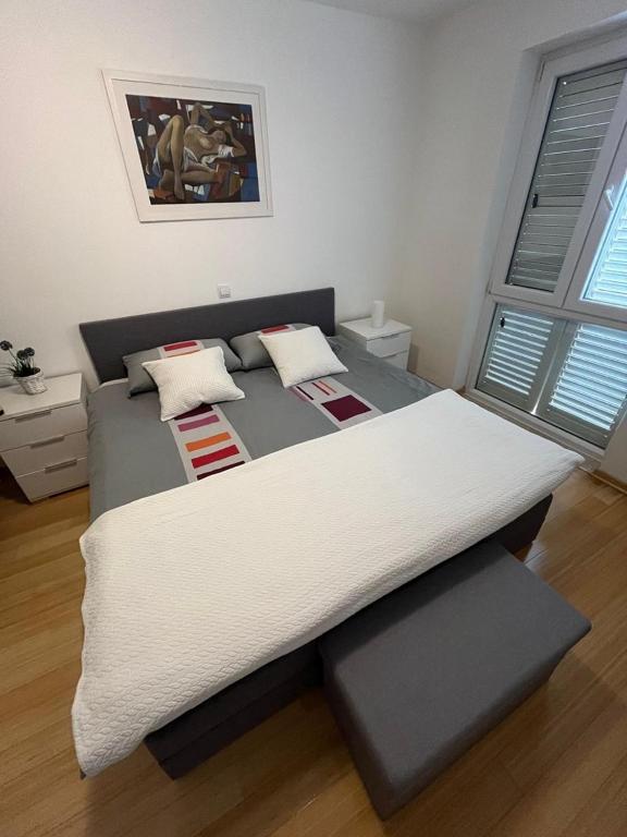 Postel nebo postele na pokoji v ubytování Apartment Lily