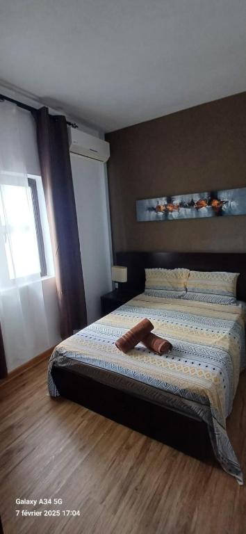 Postel nebo postele na pokoji v ubytování Le Binome