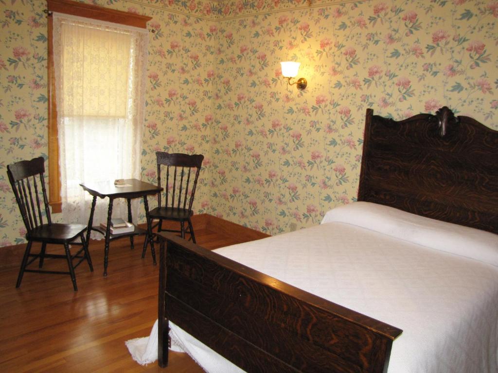 Postel nebo postele na pokoji v ubytování Hôtel Château Albert