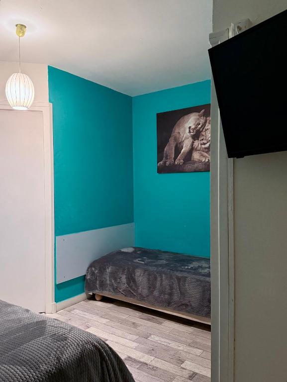 Postel nebo postele na pokoji v ubytování Le Relais de la route bleue