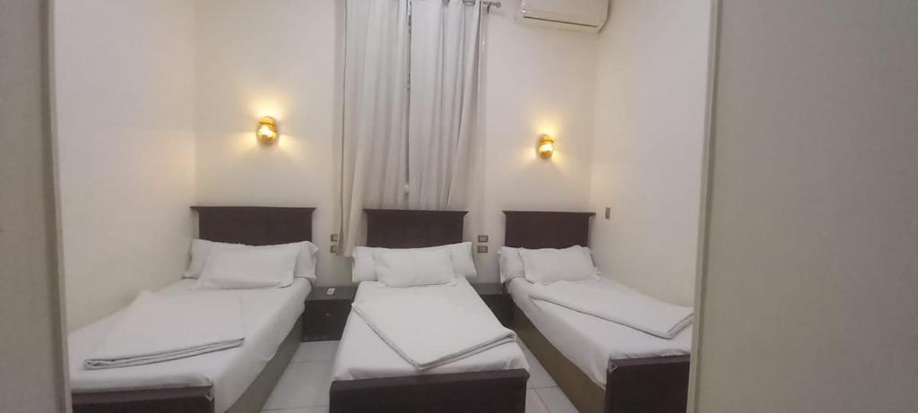 Postel nebo postele na pokoji v ubytování Five Hostel