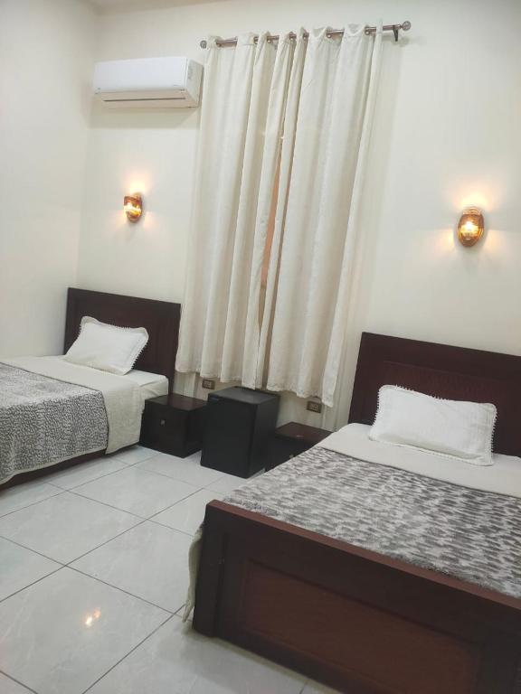 Postel nebo postele na pokoji v ubytování Five Hostel