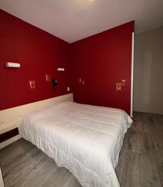 Postel nebo postele na pokoji v ubytování Le Relais de la route bleue