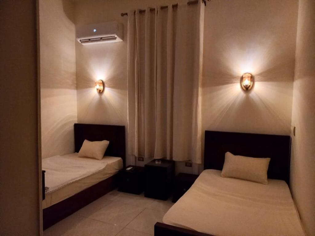 Postel nebo postele na pokoji v ubytování Five Hostel