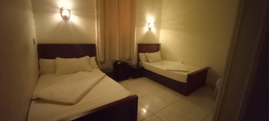 Postel nebo postele na pokoji v ubytování Five Hostel
