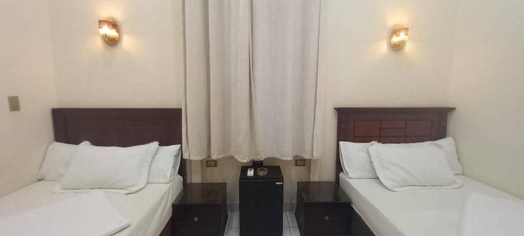 Postel nebo postele na pokoji v ubytování Five Hostel