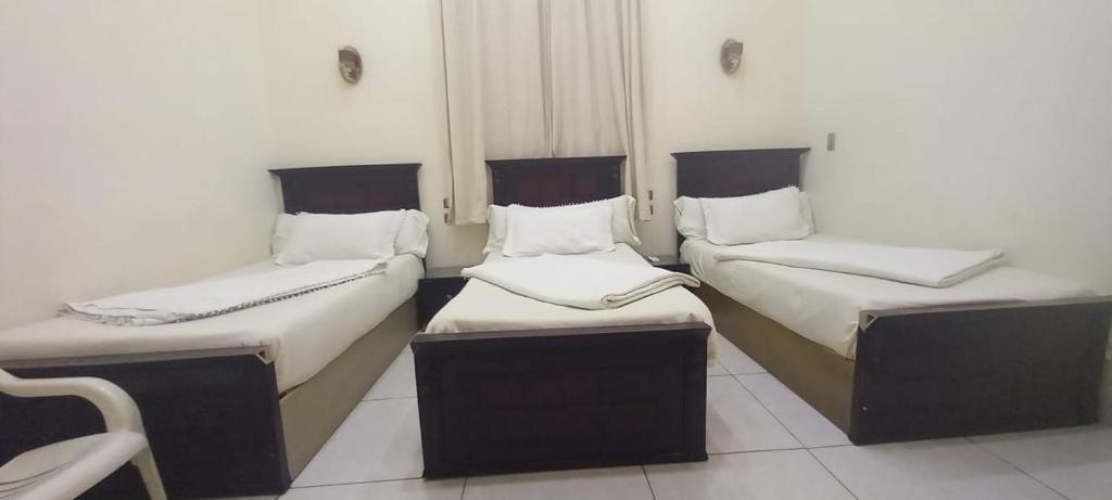 Postel nebo postele na pokoji v ubytování Five Hostel