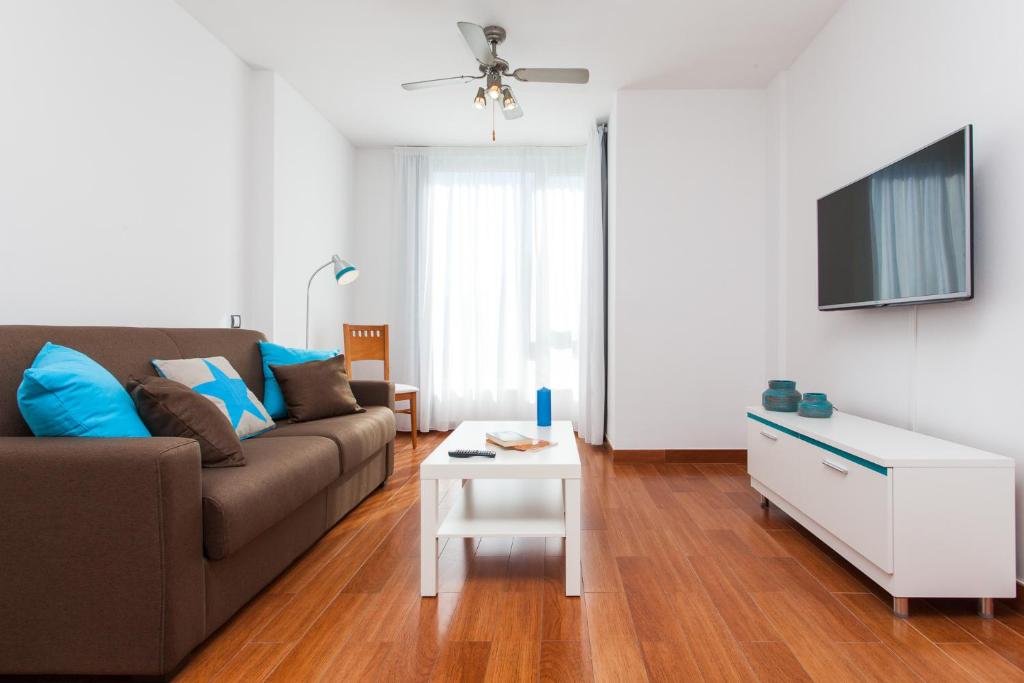 TV a/nebo společenská místnost v ubytování Corralejo Main Street Apartment