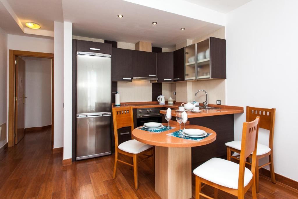Kuchyň nebo kuchyňský kout v ubytování Corralejo Main Street Apartment