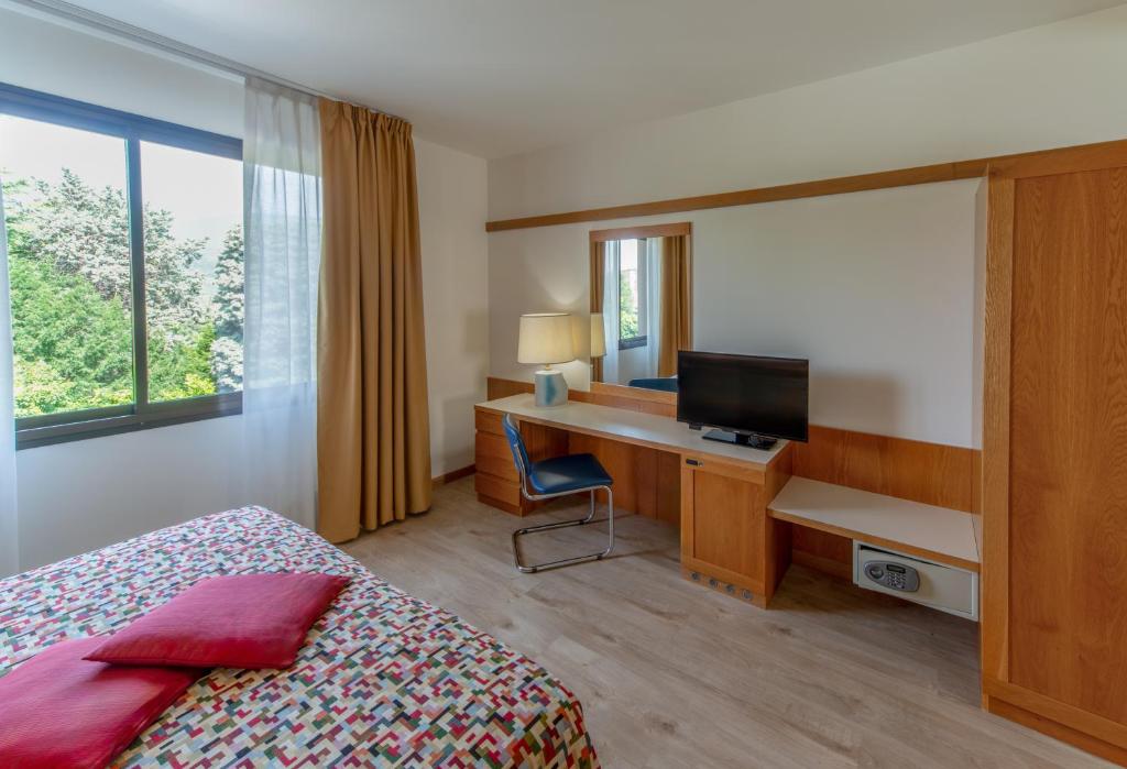TV a/nebo společenská místnost v ubytování Bonotto Hotel Palladio