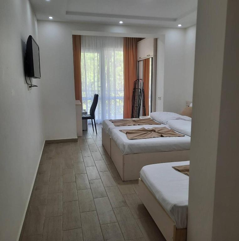 Postel nebo postele na pokoji v ubytování Kolkhida Resort & Spa