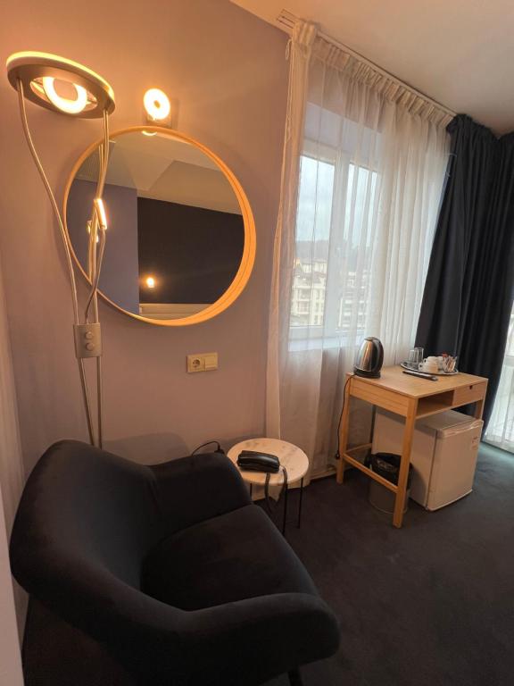 A television and/or entertainment centre at Hotel Rila