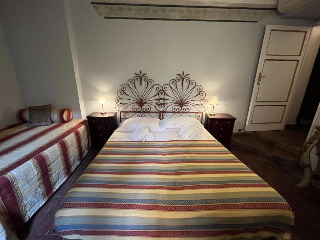 Postel nebo postele na pokoji v ubytování Al Tuscany