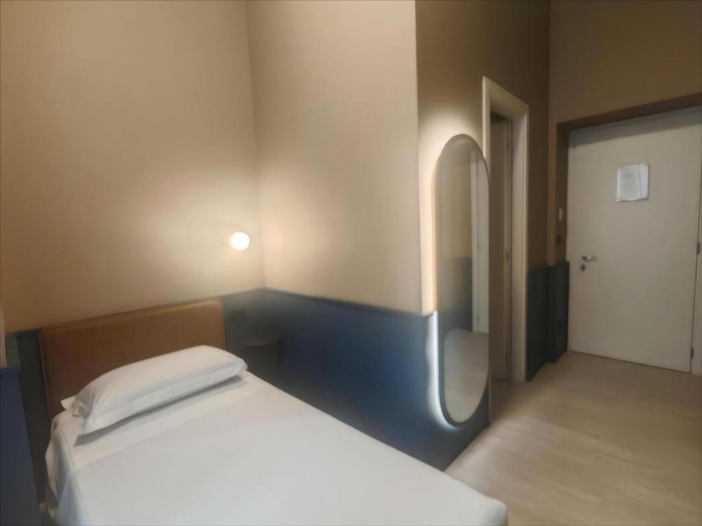 Postel nebo postele na pokoji v ubytování The B Place