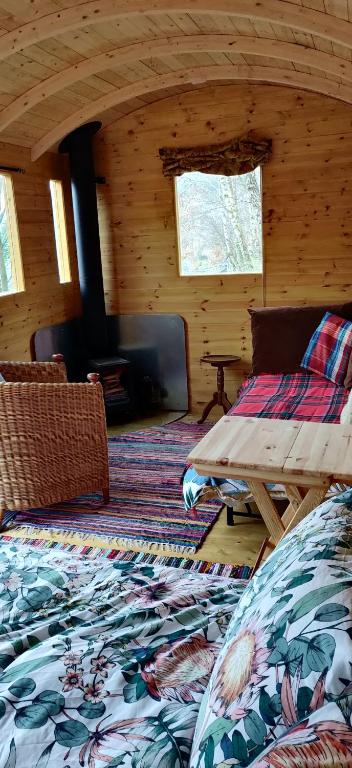 Posezení v ubytování Pike's Cabin in the Woods