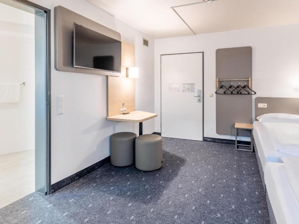Kuchyň nebo kuchyňský kout v ubytování B&B Hotel Aachen-Hbf