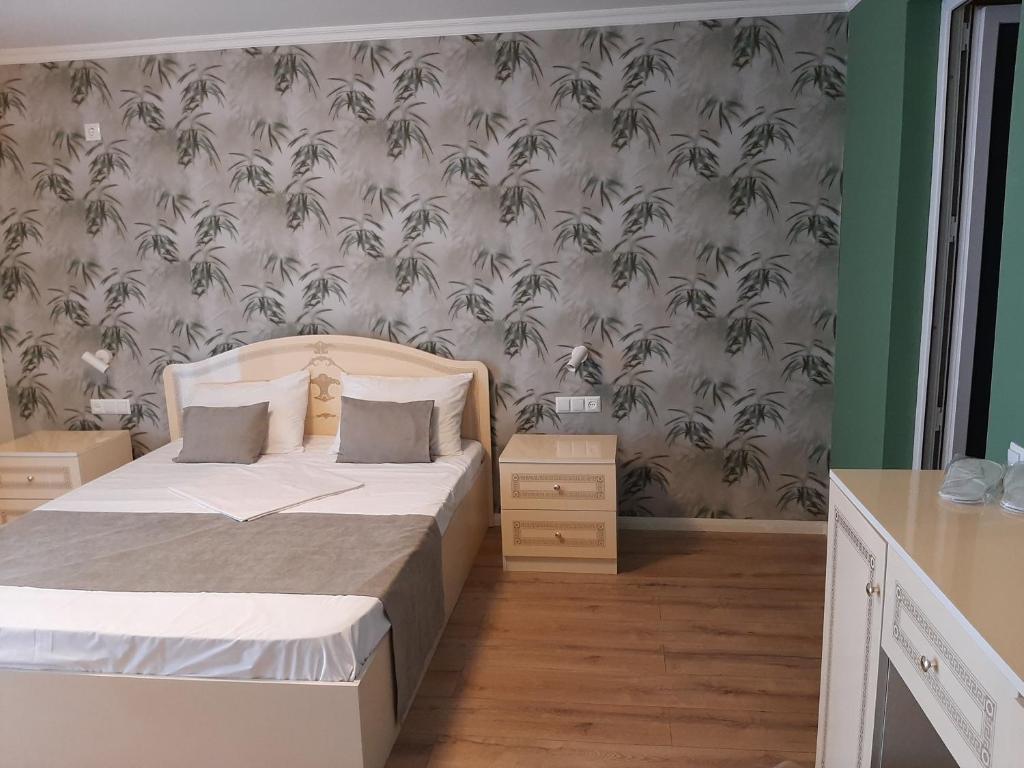 Postel nebo postele na pokoji v ubytování Kolkhida Resort & Spa