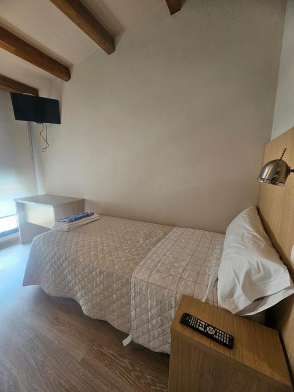 Postel nebo postele na pokoji v ubytování Área 202