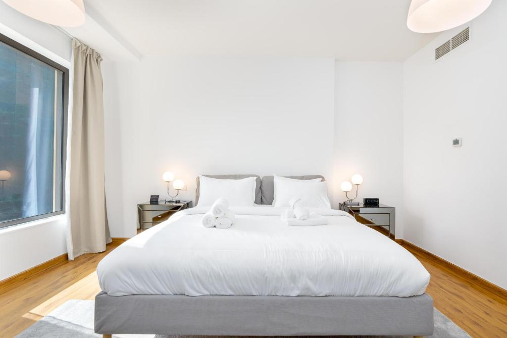 Postel nebo postele na pokoji v ubytování Spacious 1-Bedroom at the Heart of JBR