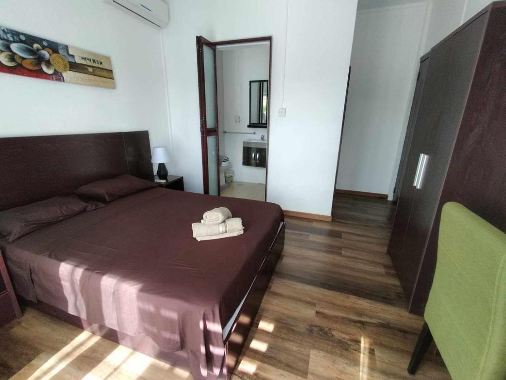 Postel nebo postele na pokoji v ubytování Le Binome