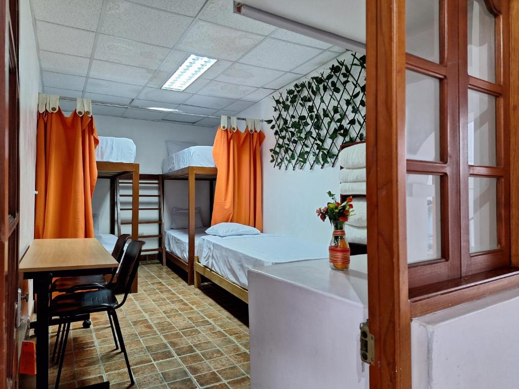 En eller flere senge i et værelse på CW Hostel Cajamarca