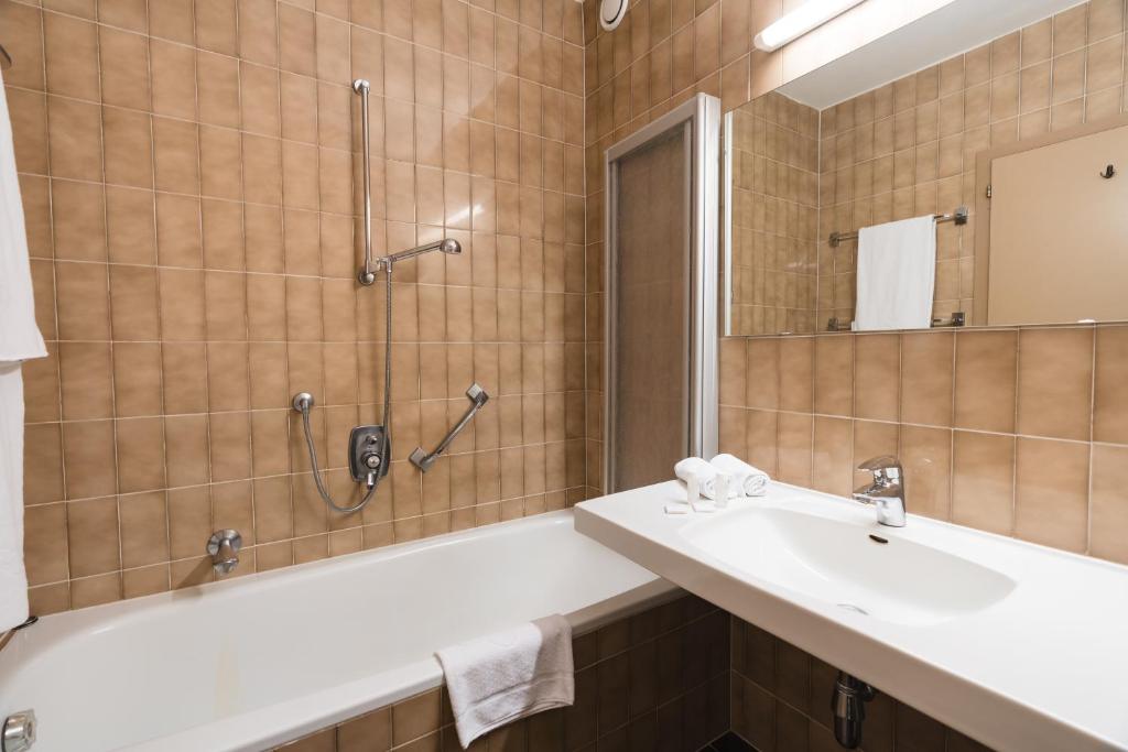 Koupelna v ubytování Smart Hotel Firn