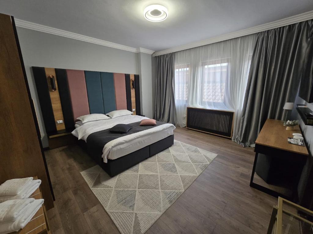 Postel nebo postele na pokoji v ubytování Hotel Yarus