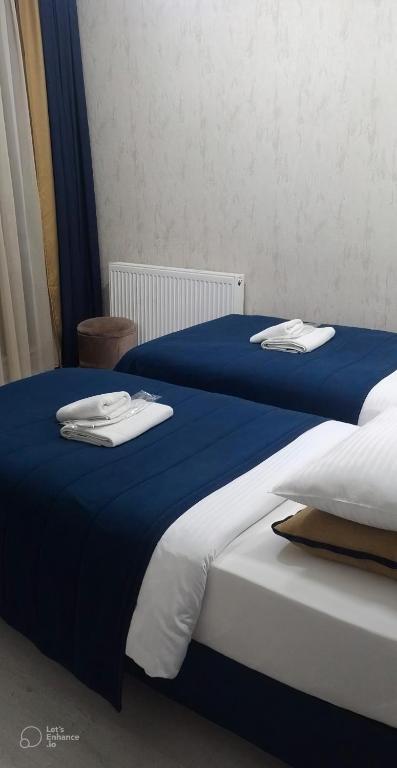 Postel nebo postele na pokoji v ubytování BALPETEK HOTEL
