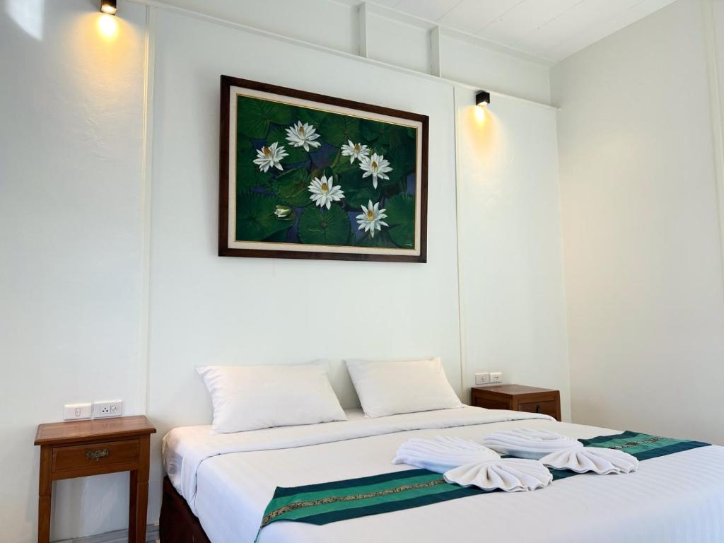 Postel nebo postele na pokoji v ubytování 3B Boutique Hotel