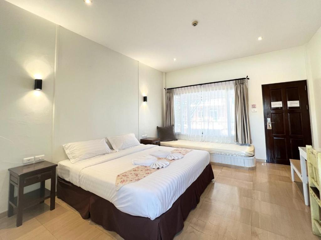 Postel nebo postele na pokoji v ubytování 3B Boutique Hotel