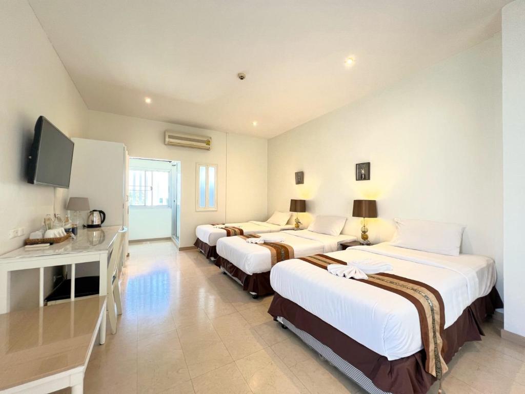 Postel nebo postele na pokoji v ubytování 3B Boutique Hotel