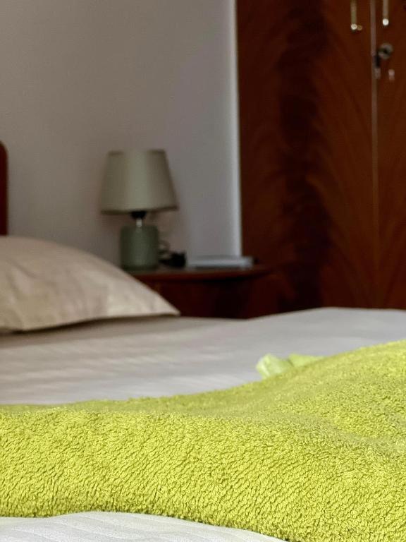 Postel nebo postele na pokoji v ubytování Cozy Rooms Korce